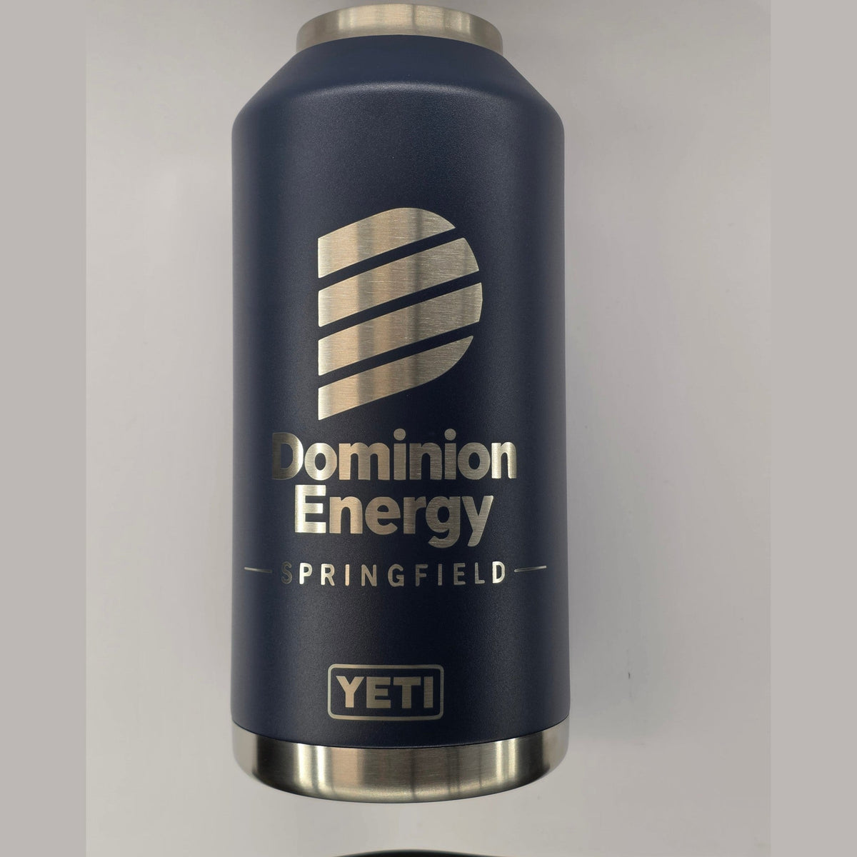 64oz navy stainless steel insulated bottle with a company logo and name laser engraved into the powder coat, exposing bright stainless steel